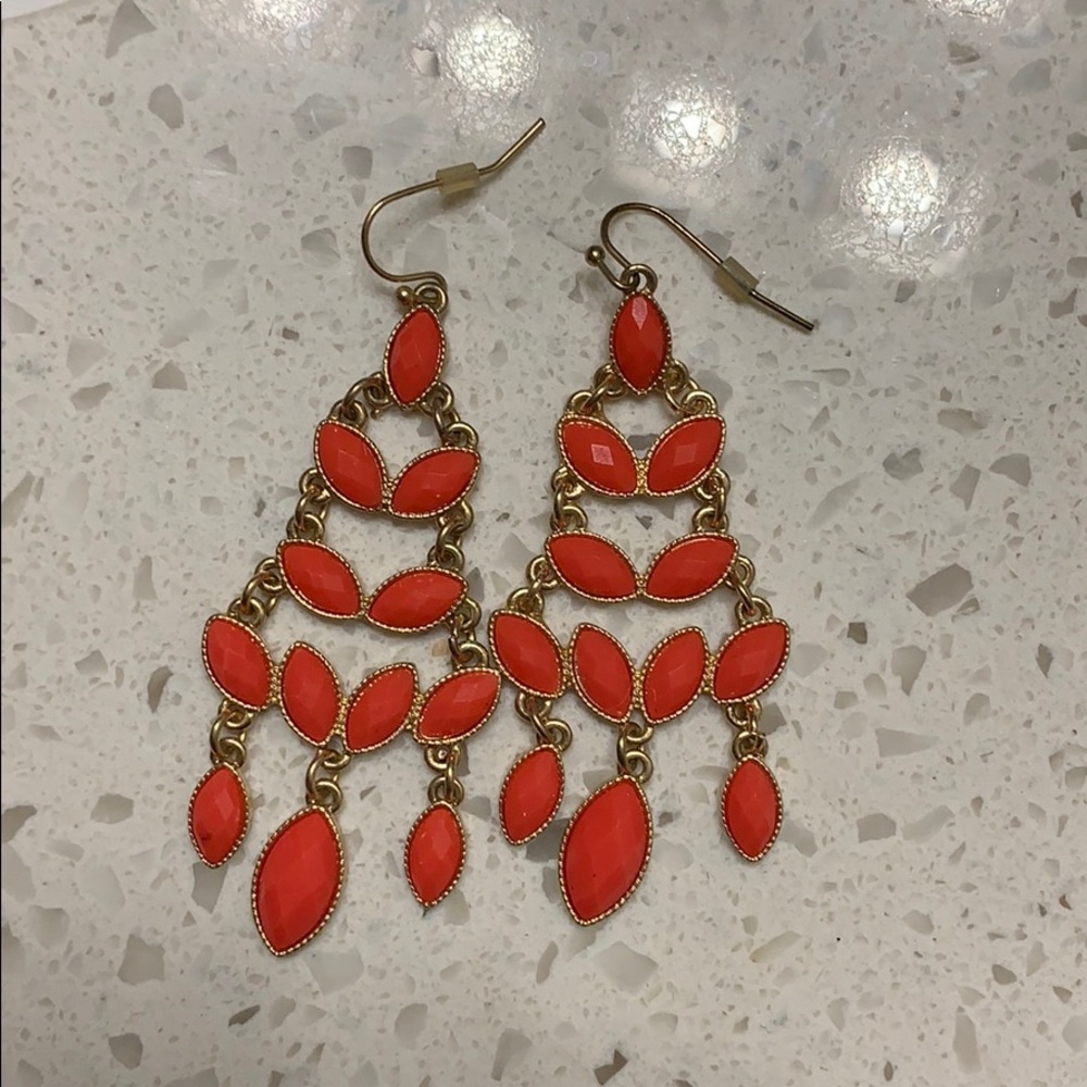 Red statement earrings